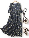 Long casual women’s dress featuring a modern print and an elegant round neckline