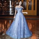 A long dress that embodies classic elegance with a feminine touch