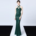 Indulge in unparalleled allure with this dress encrusted in gleaming sequins, elevating your presence with a radiant glow