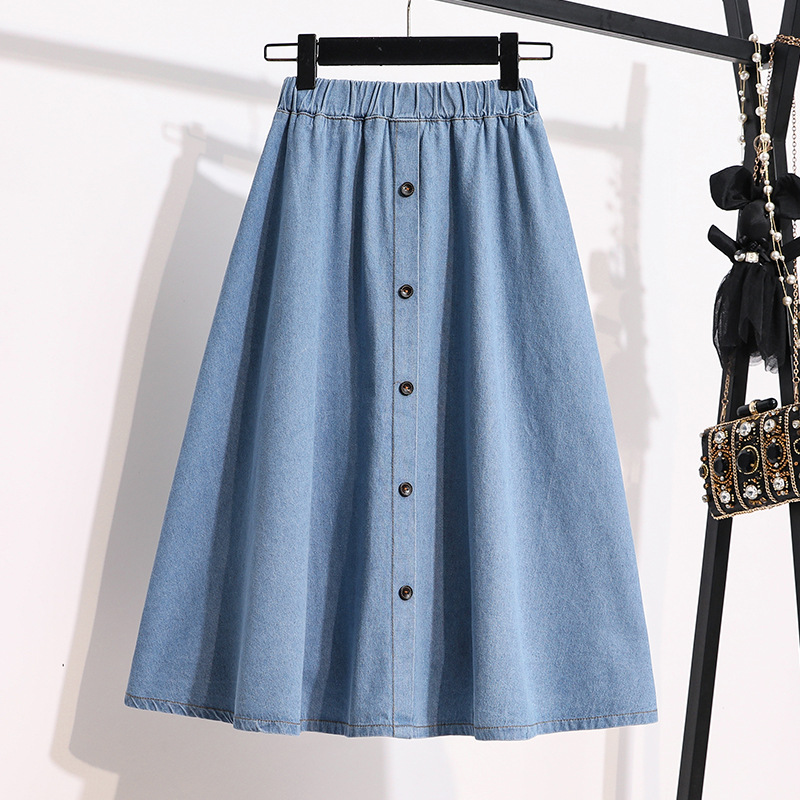 Blue denim skirt featuring a front button design and an elastic waistband for everyday comfort and style
