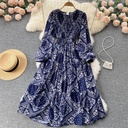 Women's long floral dress with a waist-defining design and long sleeves for an elegant feminine look