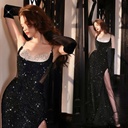 An elegant women’s evening gown with a bodice adorned in sparkling stars