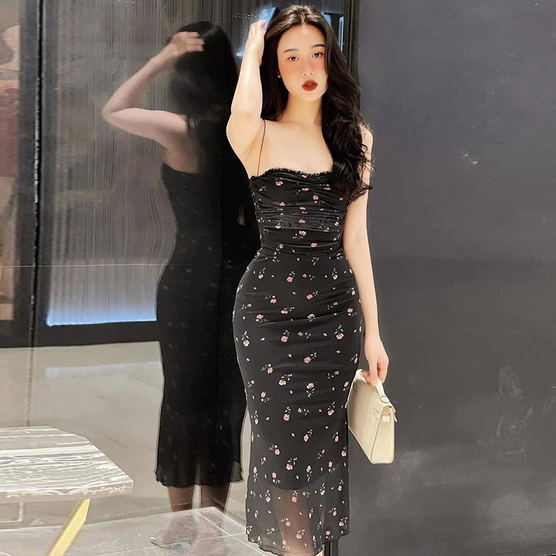 A satin dress with thin straps that combines simplicity and elegance