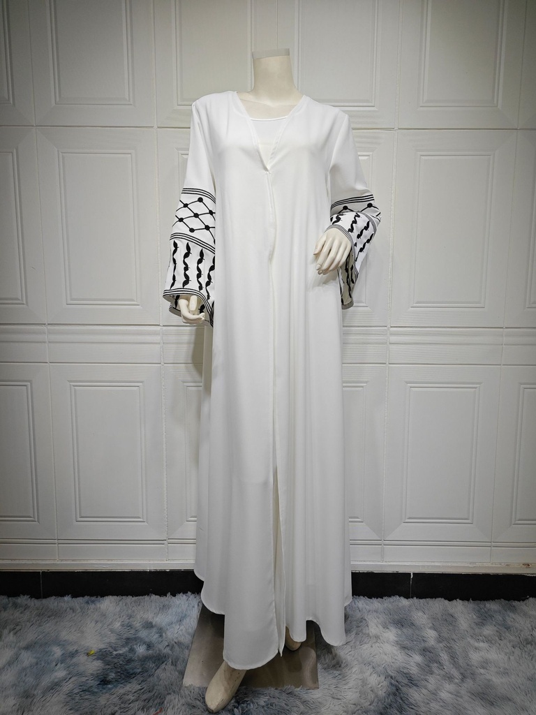 A women’s dress adorned with personalized embroidery that embodies the elegance of Eastern femininity
