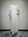 A women’s dress adorned with personalized embroidery that embodies the elegance of Eastern femininity