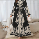Floral maxi kaftan with an elegant oriental design, featuring a high neckline, long sleeves, and an adjustable waist belt