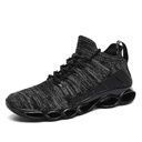 Men’s athletic shoes featuring woven mesh and a modern design