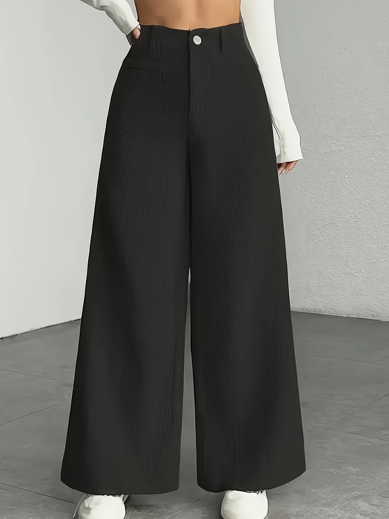 Women's high-waist wide-leg pants with a modern design and button details