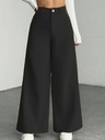 Women's high-waist wide-leg pants with a modern design and button details