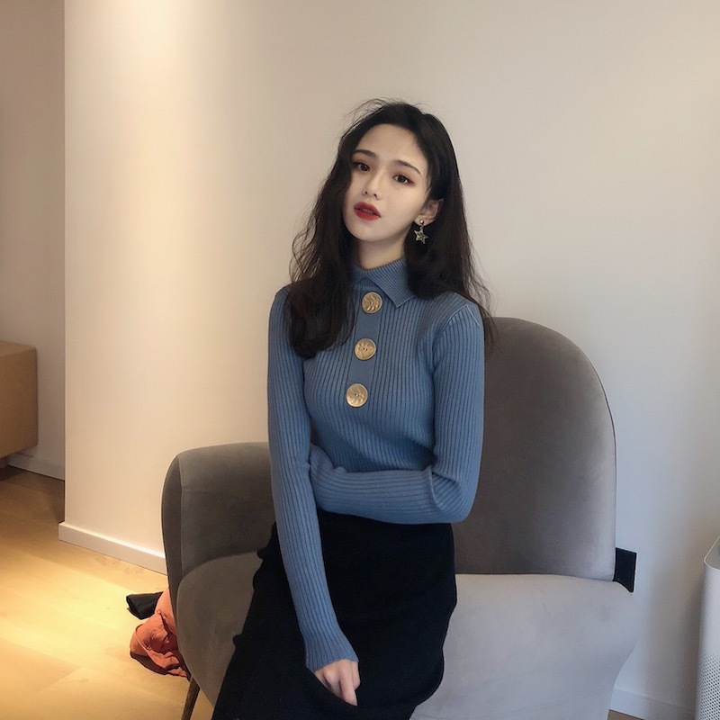 Women's blouse with a half-high neck, lapel collar, and button details
