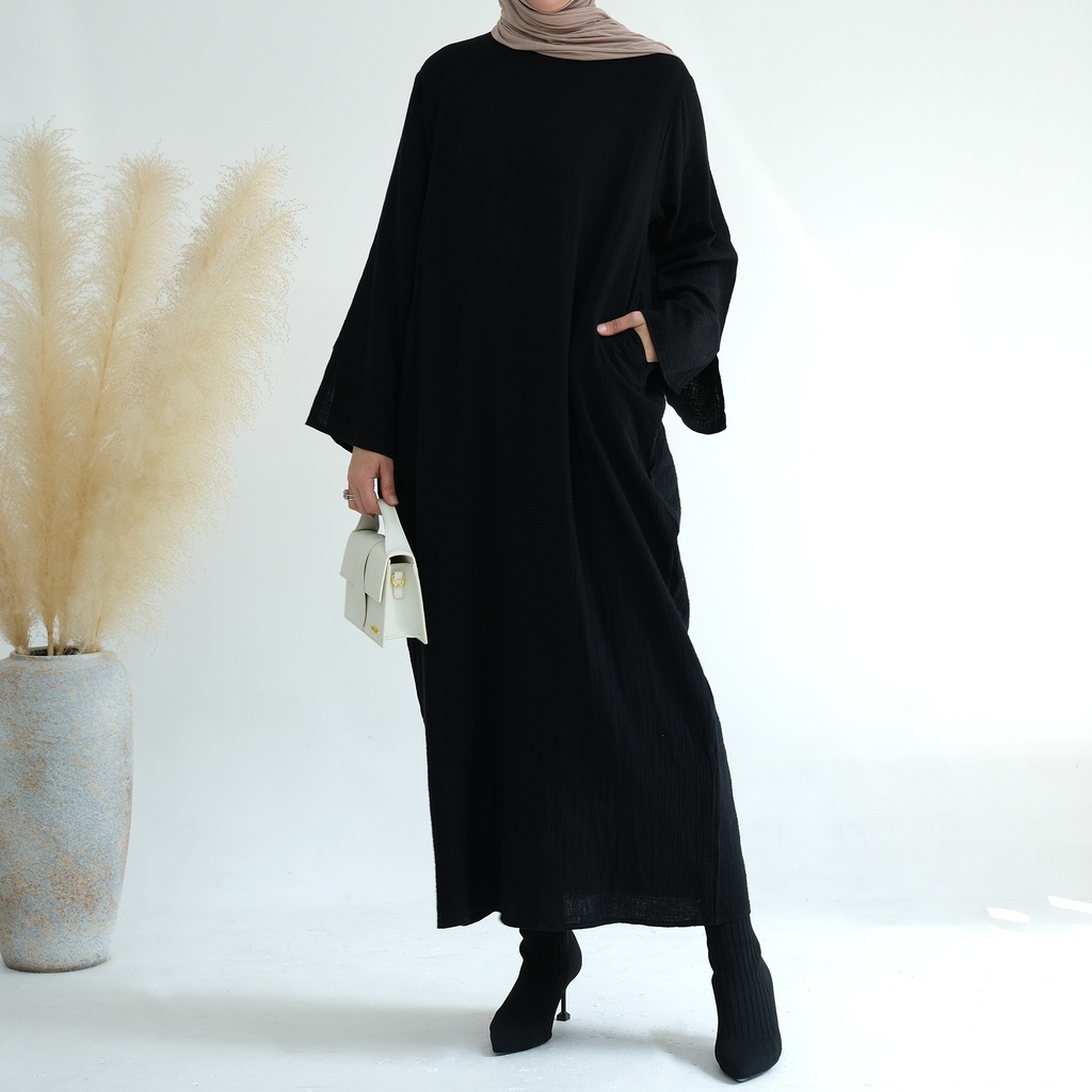 A loose abaya with an elegant and modern style 