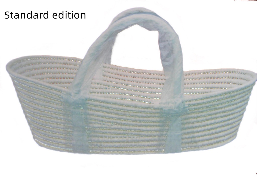 Portable baby basket woven from corn husk with a rustic design