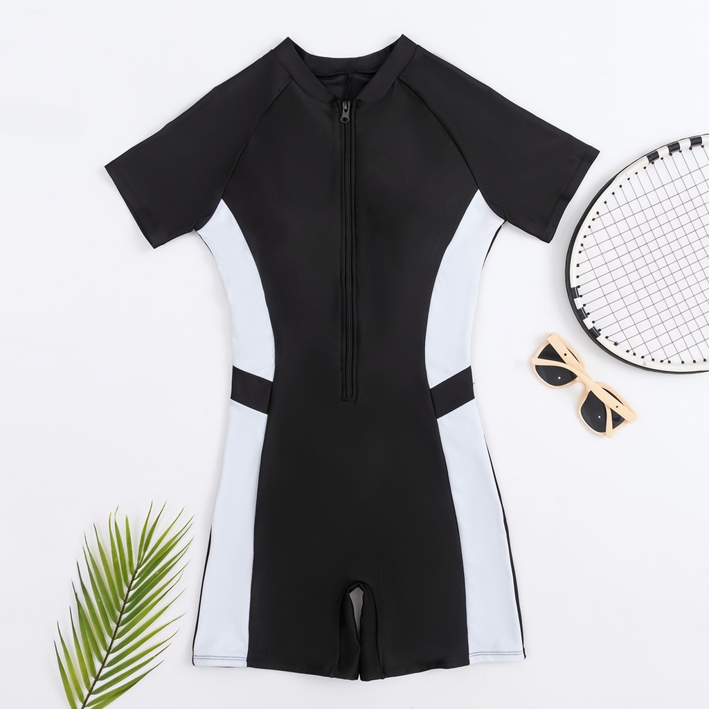One-piece swimsuit with short sleeves and a boxer-style design