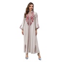A luxurious and elegant embroidered kaftan dress with Islamic heritage
