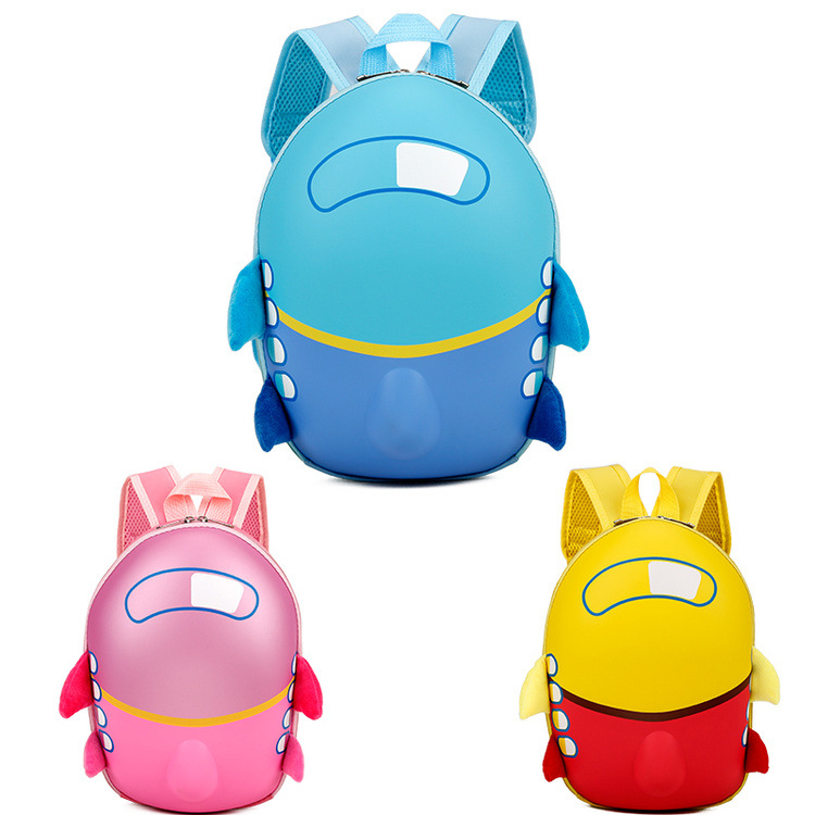A cardboard school bag with a small airplane design and a hard shell for durability and protection 