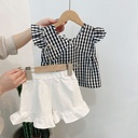 Elegant set for girls with a black and white checkered pattern 