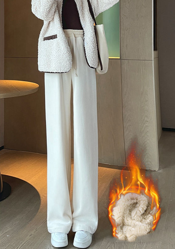 Warm winter pants with a wide-leg cut, made from thick, soft wool lined with fleece to provide maximum warmth and comfort