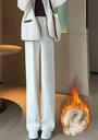 Warm winter pants with a wide-leg cut, made from thick, soft wool lined with fleece to provide maximum warmth and comfort