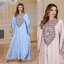 An elegant embroidered dress with a luxurious design, perfect for special occasions.