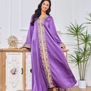 A luxurious abaya made from premium fabric with Arabic embroidery that enhances the traditional heritage 