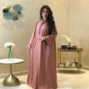 An authentic Arabian abaya with an elegant Islamic design and luxurious touches inspired by Eastern heritage 