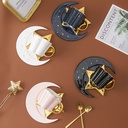 A creative ceramic coffee cup set with a saucer decorated with a star and crescent 