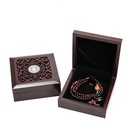 Elegant and luxurious wooden jewelry box for storing jewelry and precious valuables in a refined and sophisticated style