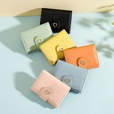A compact women's wallet with a foldable design, combining elegance and functionality