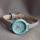Elegant Women's Watch with a Gray-Blue Round Dial and a Stylish Strap