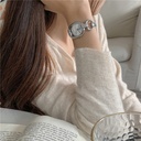 Women's watch with an elegant artistic design, featuring a stylish dial and a steel strap