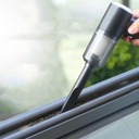 Small cordless handheld vacuum with powerful suction for efficiently cleaning tight corners and window edges 