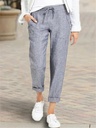 Elegant and practical casual pants with a high drawstring waist, made from cotton and linen fabric, featuring a loose and comfortable fit with functional pockets