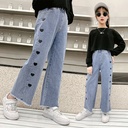 Girls' wide-leg jeans with a stylish design, offering a modern and comfortable look suitable for various everyday occasions
