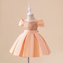 Girls' party and occasion dress with an elegant suspender design, adorned with shiny sequins and luxurious fabric for a stunning and glamorous look