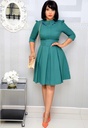 An elegant solid-color dress featuring a round neckline, refined embroidery at the waist, and delicate stitching details that give you a stylish and feminine look