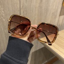 Retro women's sunglasses with a large square frame and elegant classic design