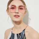 Oversized women's square sunglasses with a vintage design – featuring a transparent frame and ocean-colored lenses