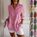 Elegant women's shirt with a classic lapel and long sleeves, featuring a single-breasted design and pleated details that add a refined and feminine touch