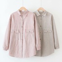 Oversized striped long-sleeve shirt inspired by classic style for an elegant and comfortable look