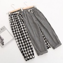 Women's casual pants with a plaid pattern and cropped nine-tenths length cut
