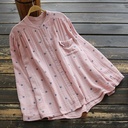 Soft cotton blouse with long sleeves, featuring a cardigan-style design and elegant print