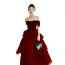 Luxurious French evening dress with a puffy skirt and a refined, elegant touch