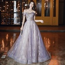 A long dress that embodies classic elegance with a feminine touch