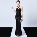 Indulge in unparalleled allure with this dress encrusted in gleaming sequins, elevating your presence with a radiant glow