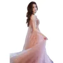 An elegant evening dress with a modern design that highlights sophistication and charm
