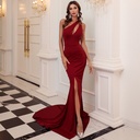 Elegant evening dress in wine red, featuring a modern one-shoulder design with a trailing back