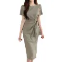 A women’s dress with a round neckline and a wrap-tie waist