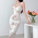 A satin dress with thin straps that combines simplicity and elegance