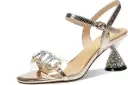Trendy leather sandals adorned with rhinestones and transparent straps