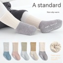 Baby socks made of combed cotton with thick fleece lining